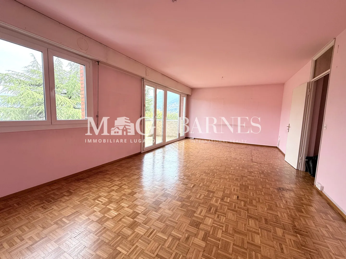 Paradiso : Appartement 3,5 pièces avec vue dégagée et garage privé - Photo 3 sur 7