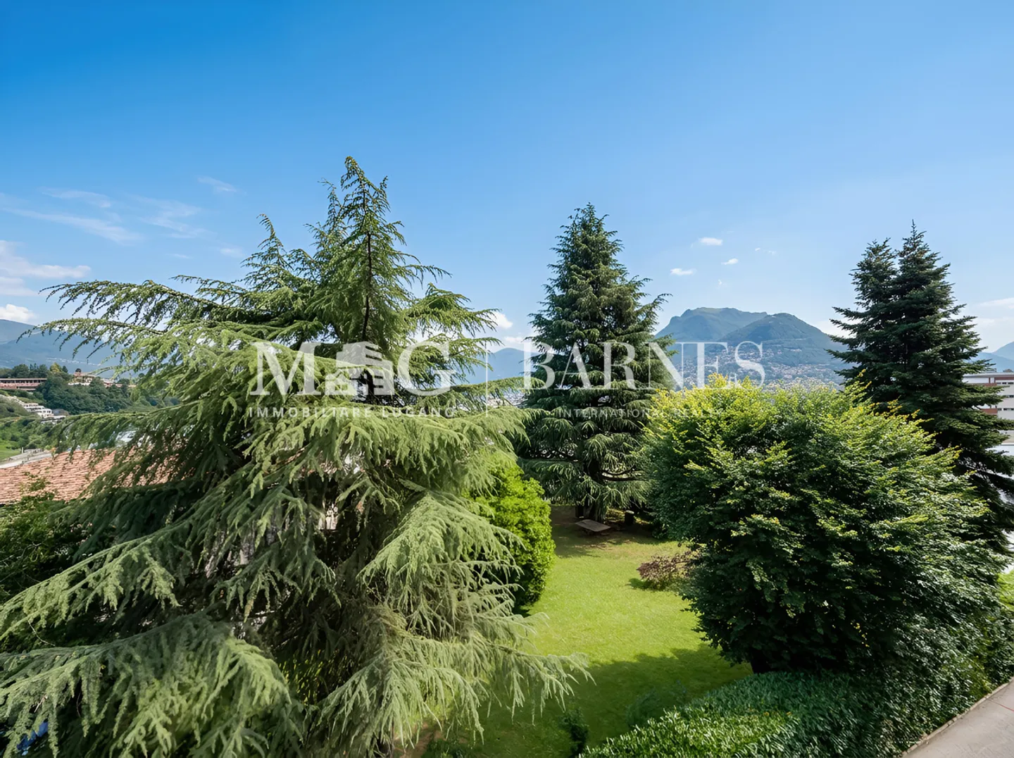 Paradiso : Appartement 3,5 pièces avec vue dégagée et garage privé - Photo 7 sur 7