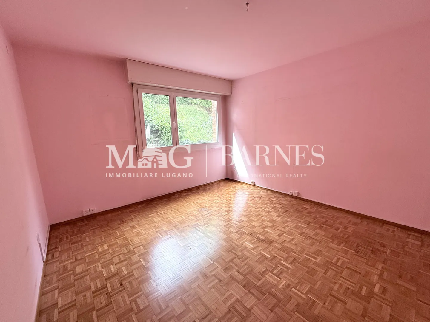 Paradiso : Appartement 3,5 pièces avec vue dégagée et garage privé - Photo 5 sur 7