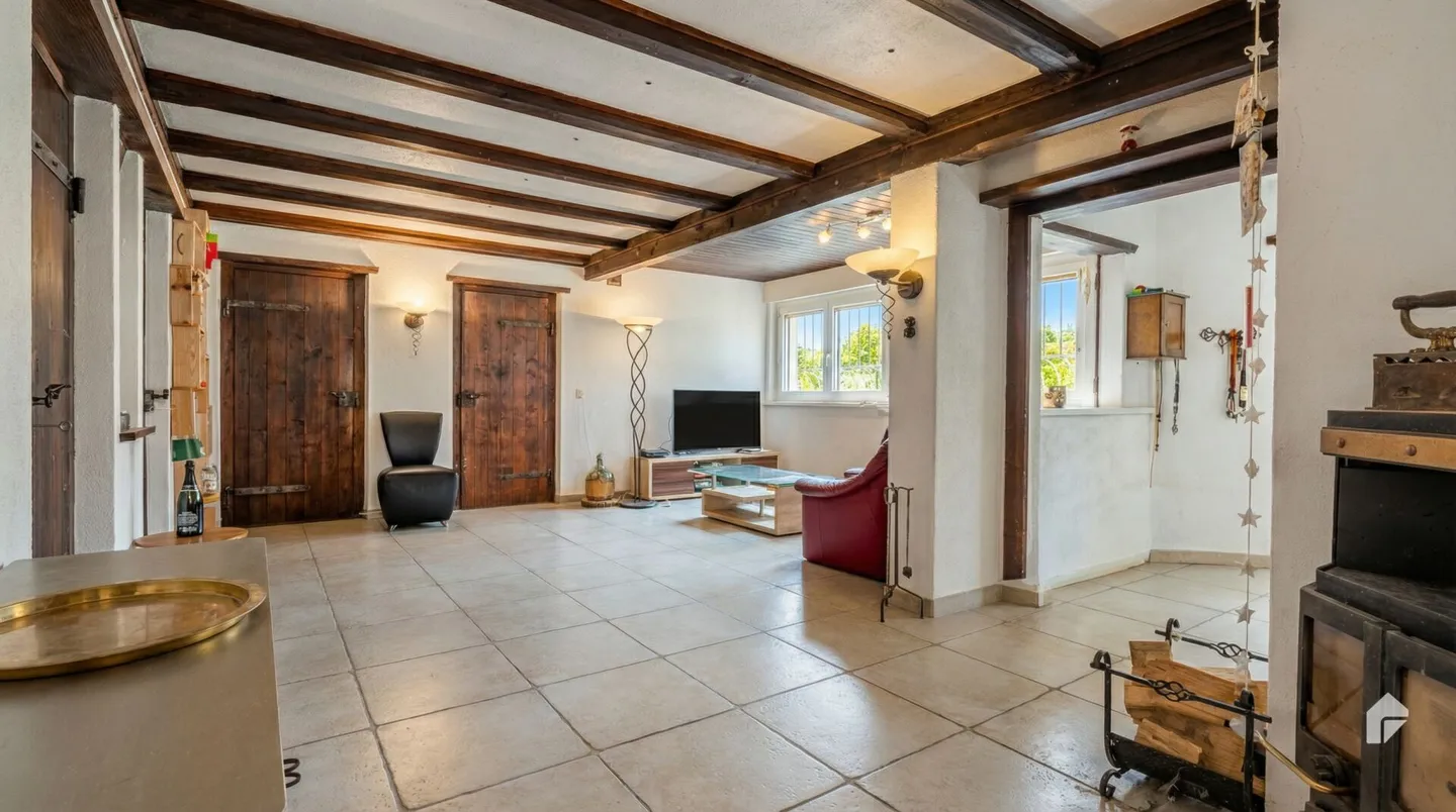 Maison individuelle située au calme avec beaucoup de potentiel - Photo 5 sur 9