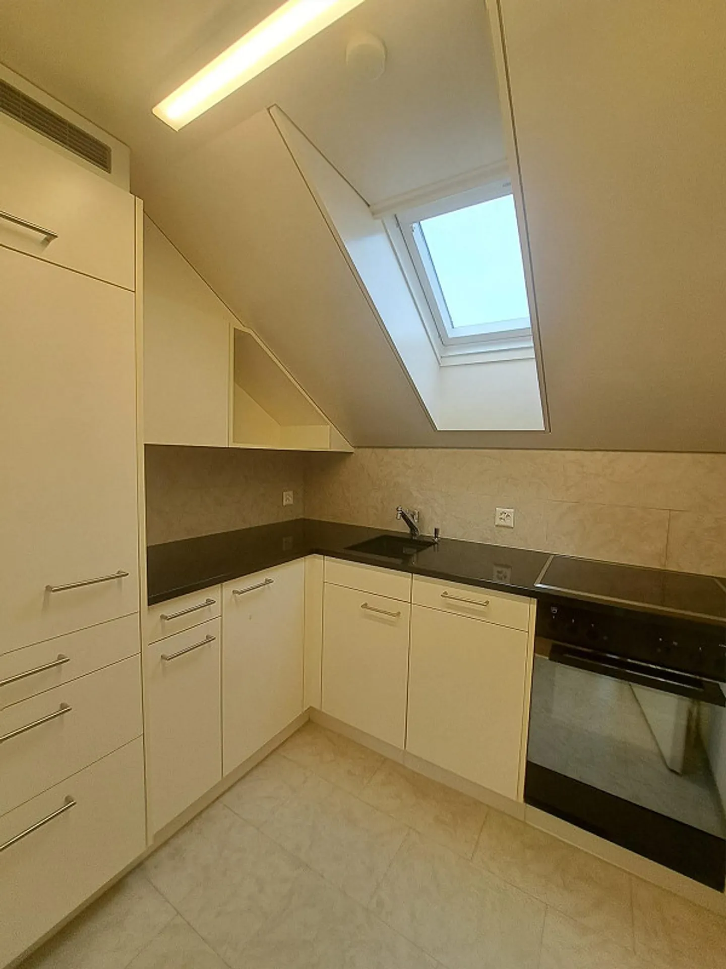 Appartement sous les combles de 2,5 pièces - Photo 6 sur 6