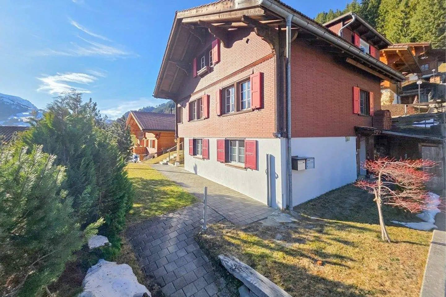 Living, investing, and enjoying on the sunny side of Adelboden with a view of the Lohner. - Photo 2 of 13