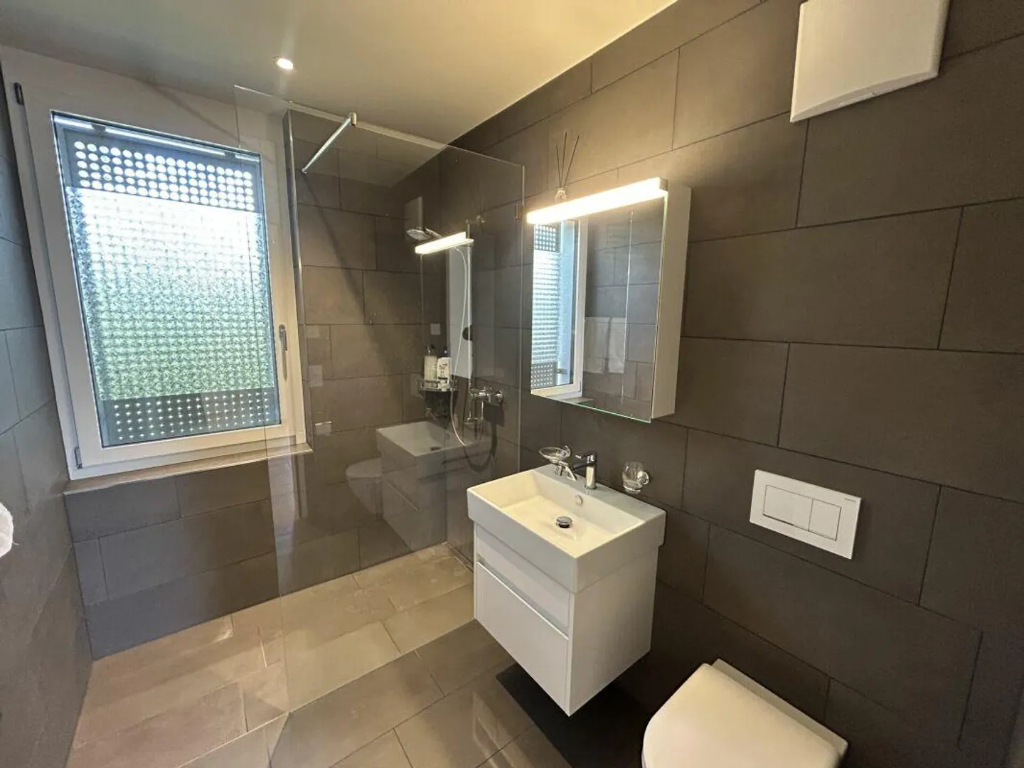Appartement en attique de 4,5 pièces au standard de propriété recherché ? - Photo 10 sur 18