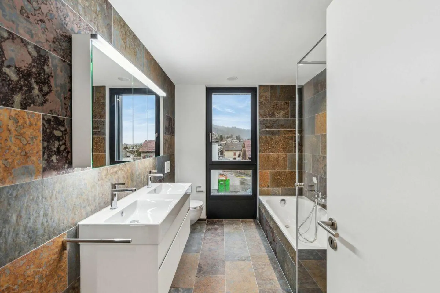 Modernes Mehrfamilienhaus mit Aussicht - Foto 9 von 12