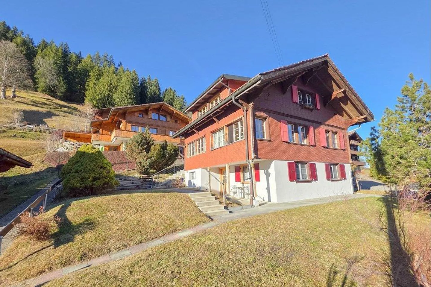 Living, investing, and enjoying on the sunny side of Adelboden with a view of the Lohner. - Photo 1 of 13