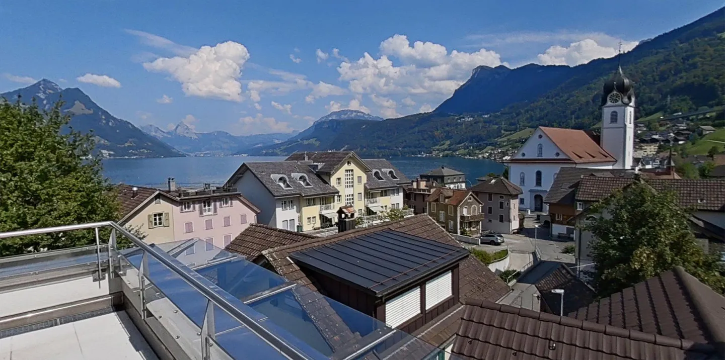 Penthouse apartment with 360° lake and mountain views in the heart of Beckenried - Photo 1 of 1