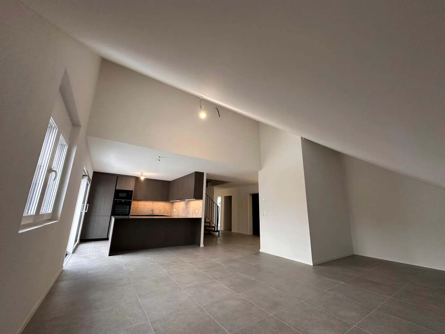 Duplex Charmant à Corcelles - Photo 2 sur 10