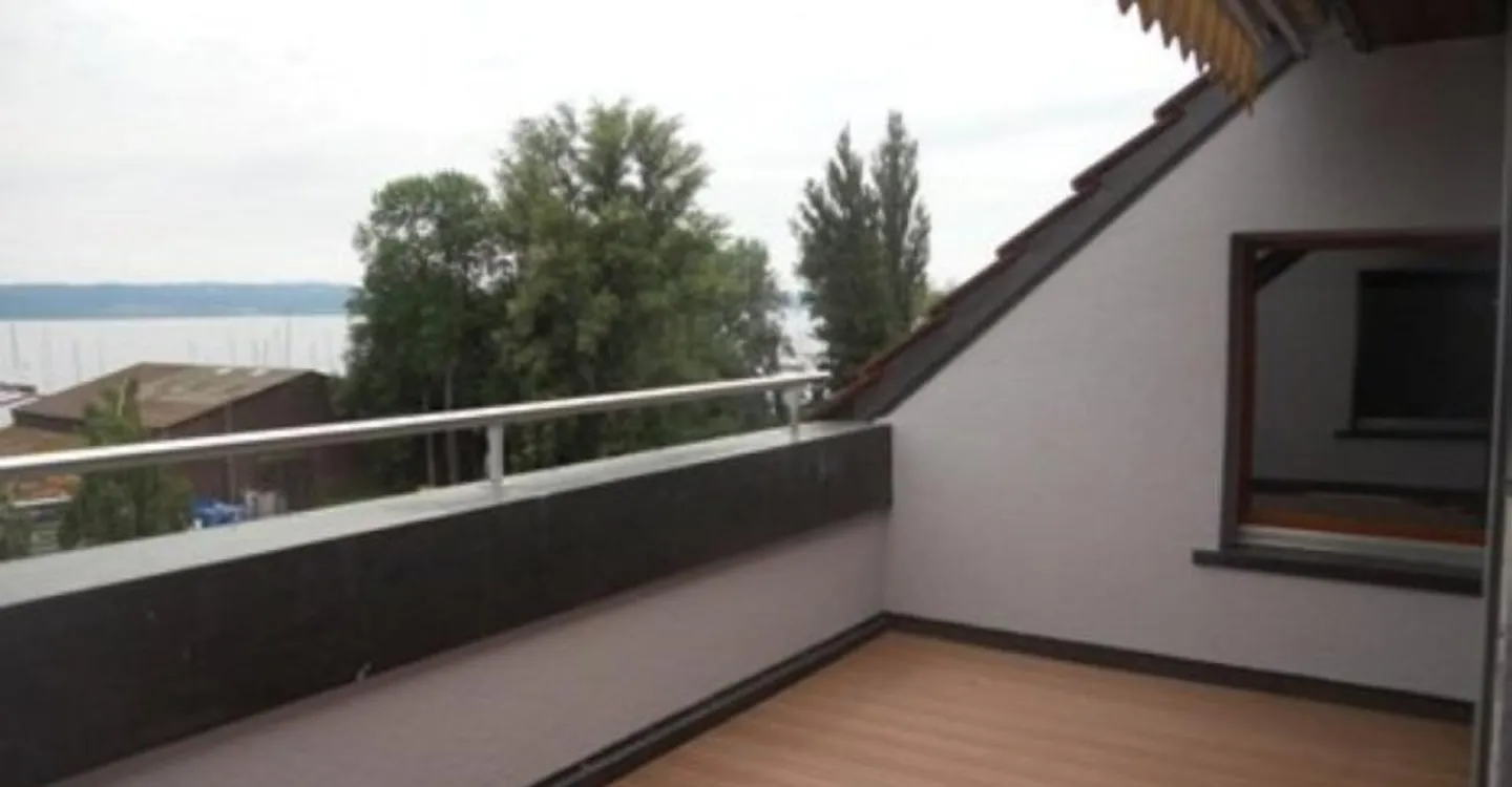 Appartement en Attique avec Vue sur le Lac - Photo 1 sur 8