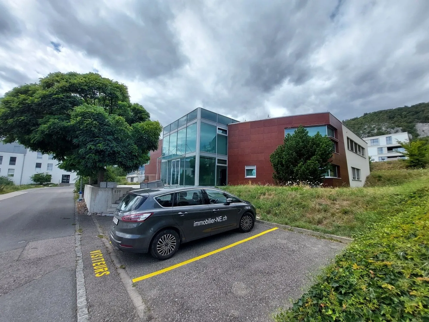 Commercial building with 23 outdoor parking spaces - Photo 1 of 13