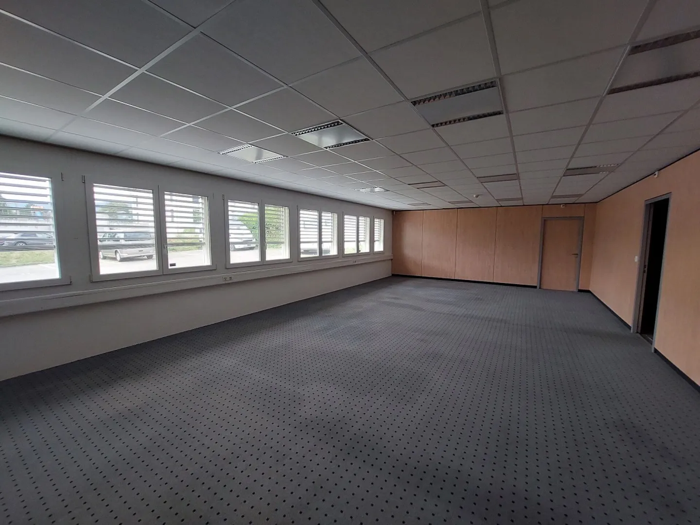 Commercial building with 23 outdoor parking spaces - Photo 10 of 13