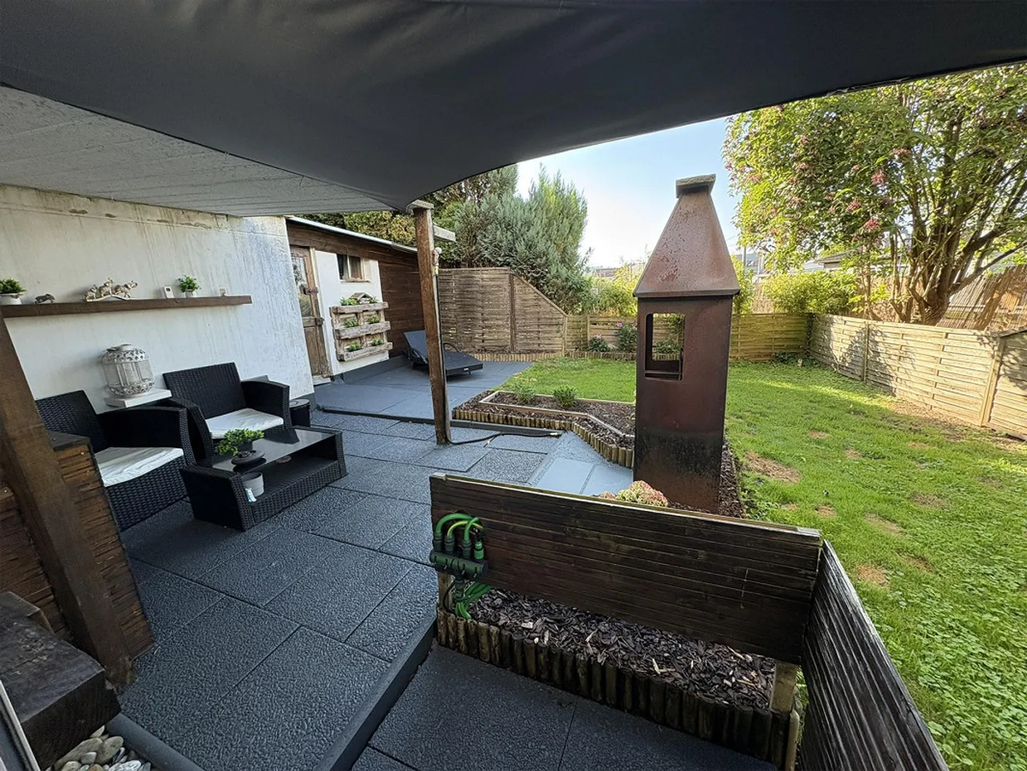 Casa a schiera accogliente di 3,5 stanze con giardino privato - Foto 5 di 11