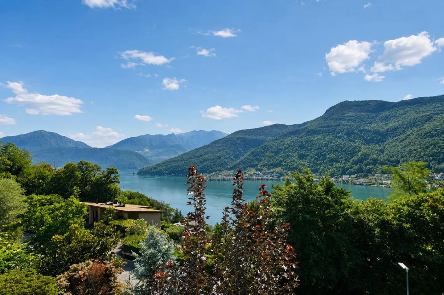 Villa panoramique avec vue imprenable sur le lac de Lugano à Morcote - Photo 6 sur 23