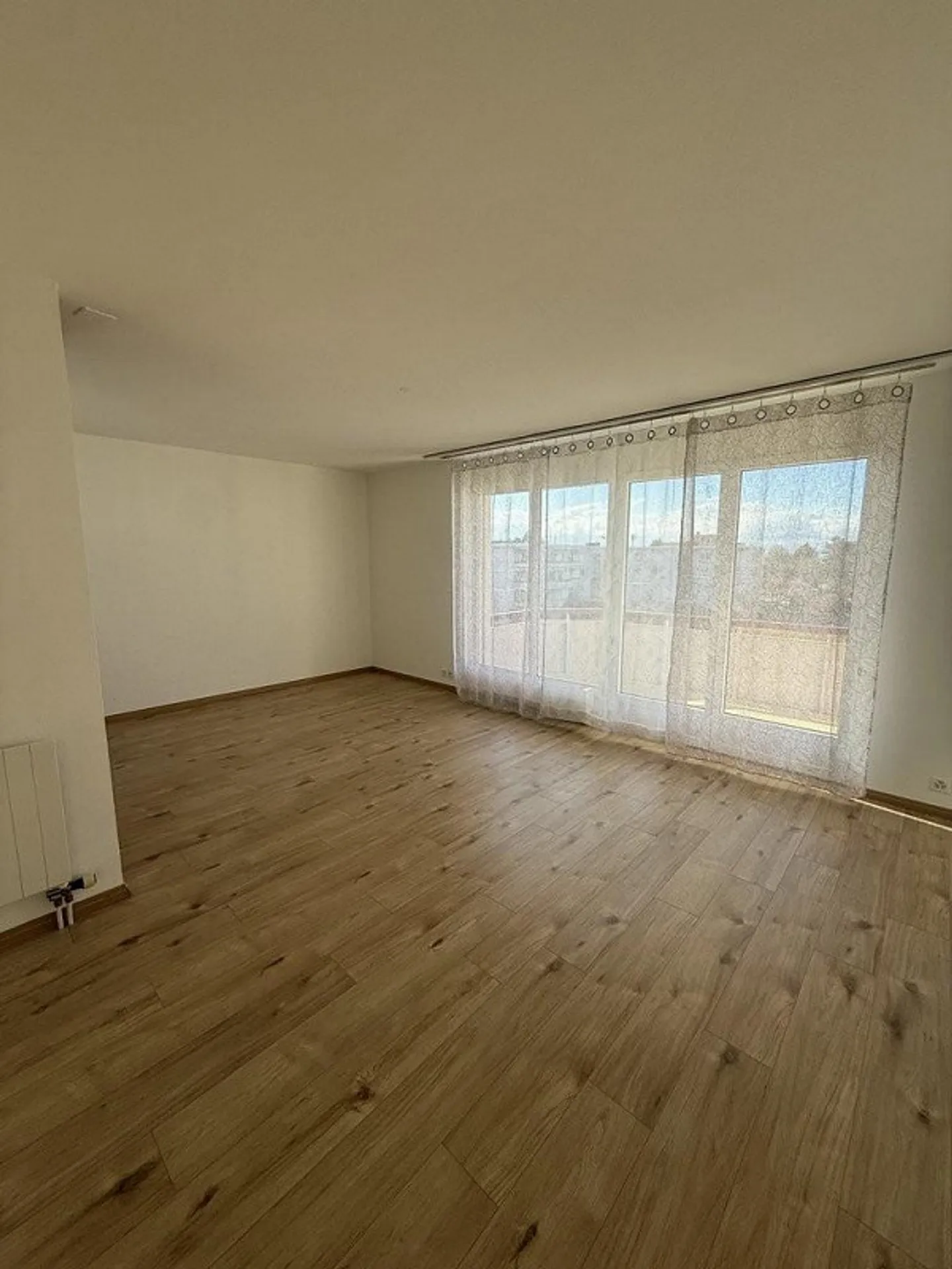 Appartement spacieux dans quartier familial - Photo 4 sur 9