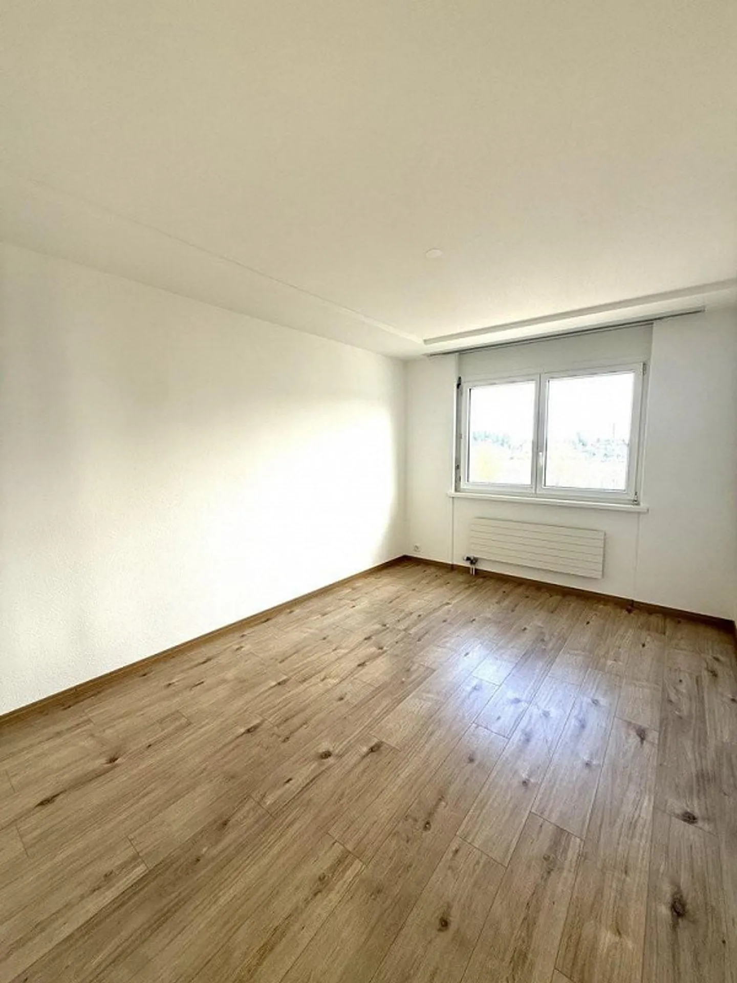 Appartement spacieux dans quartier familial - Photo 5 sur 9