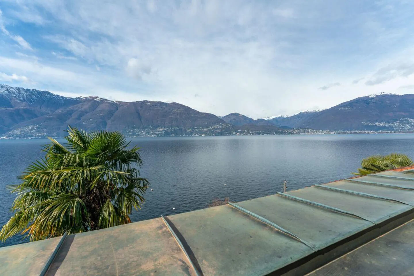 Appartamento attico affascinante di 3,5 stanze con vista sul lago, terrazza e balcone sud - Foto 2 di 16