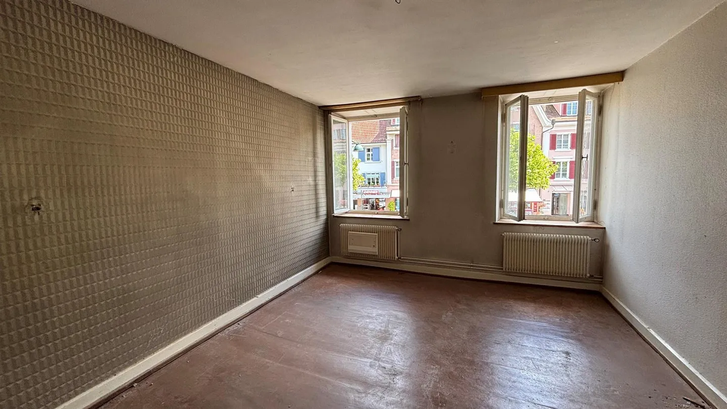 Versatile residential and commercial building in the center of Muttenz - Photo 6 of 13