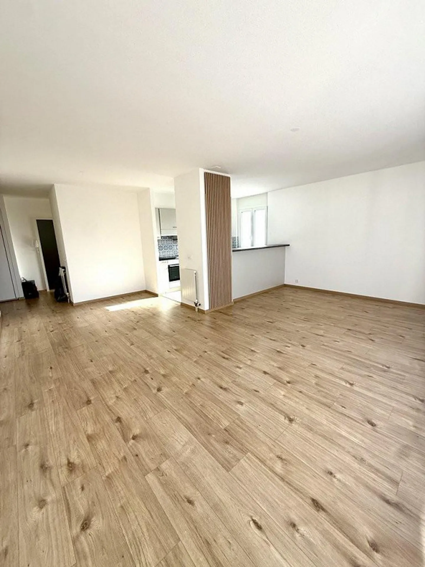 Appartement spacieux dans quartier familial - Photo 2 sur 9