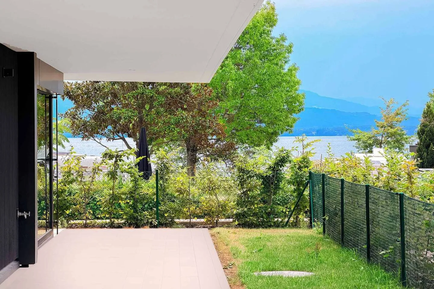 Appartamento nuovo di 5,5 locali con terrazza coperta e giardino - Foto 8 di 13