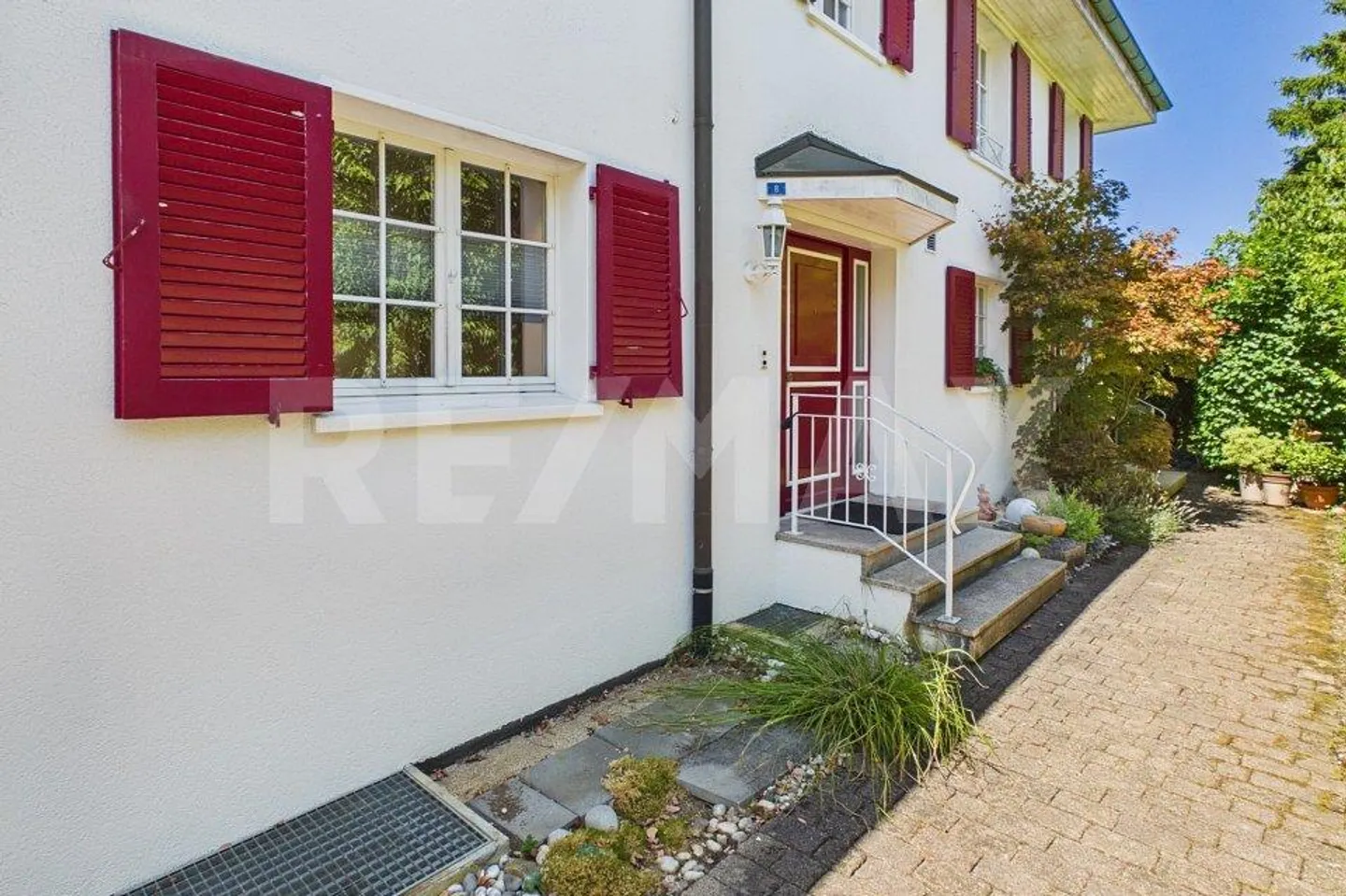 Incantevole casa a schiera con giardino - Foto 1 di 13