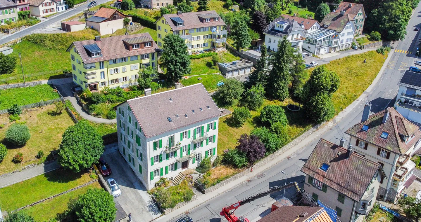 Mietshaus mit 6 Wohnungen und großem Garten Im Herzen des Dorfes - Foto 7 von 10