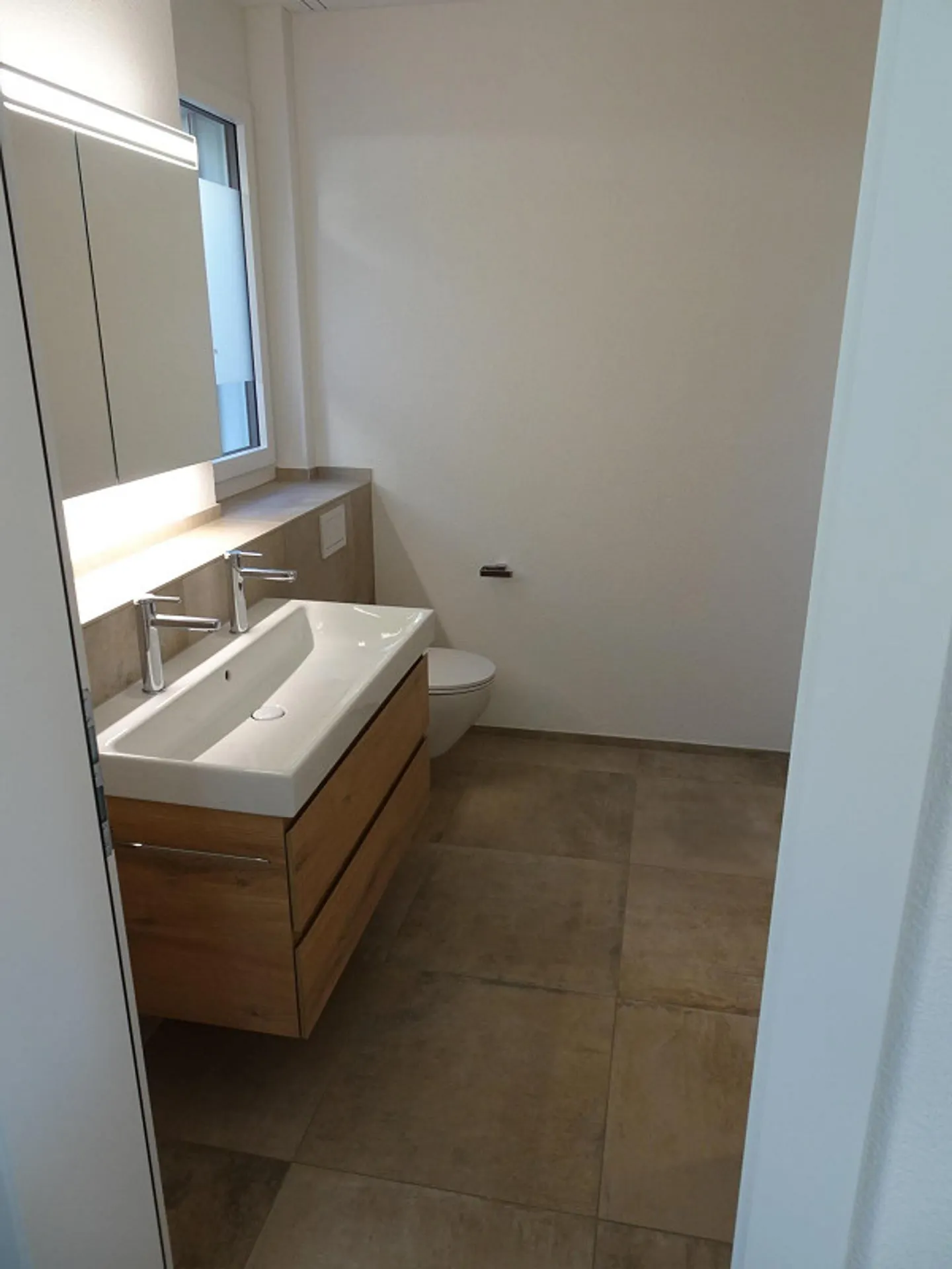 Appartement haut de gamme incluant 2 places de garage et charges - Photo 17 sur 26