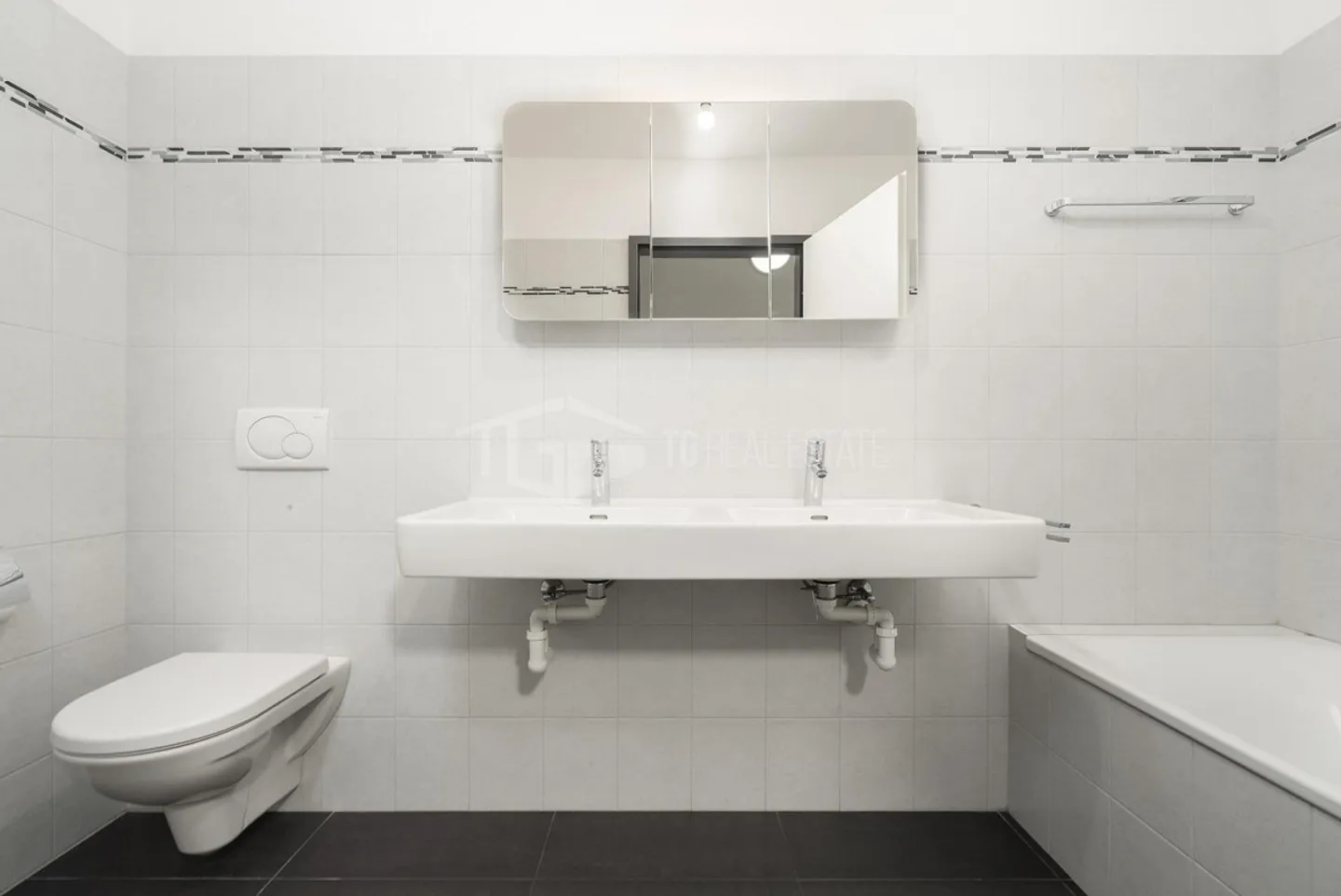 Elegante Dachgeschosswohnung in Cadro - Foto 2 von 10