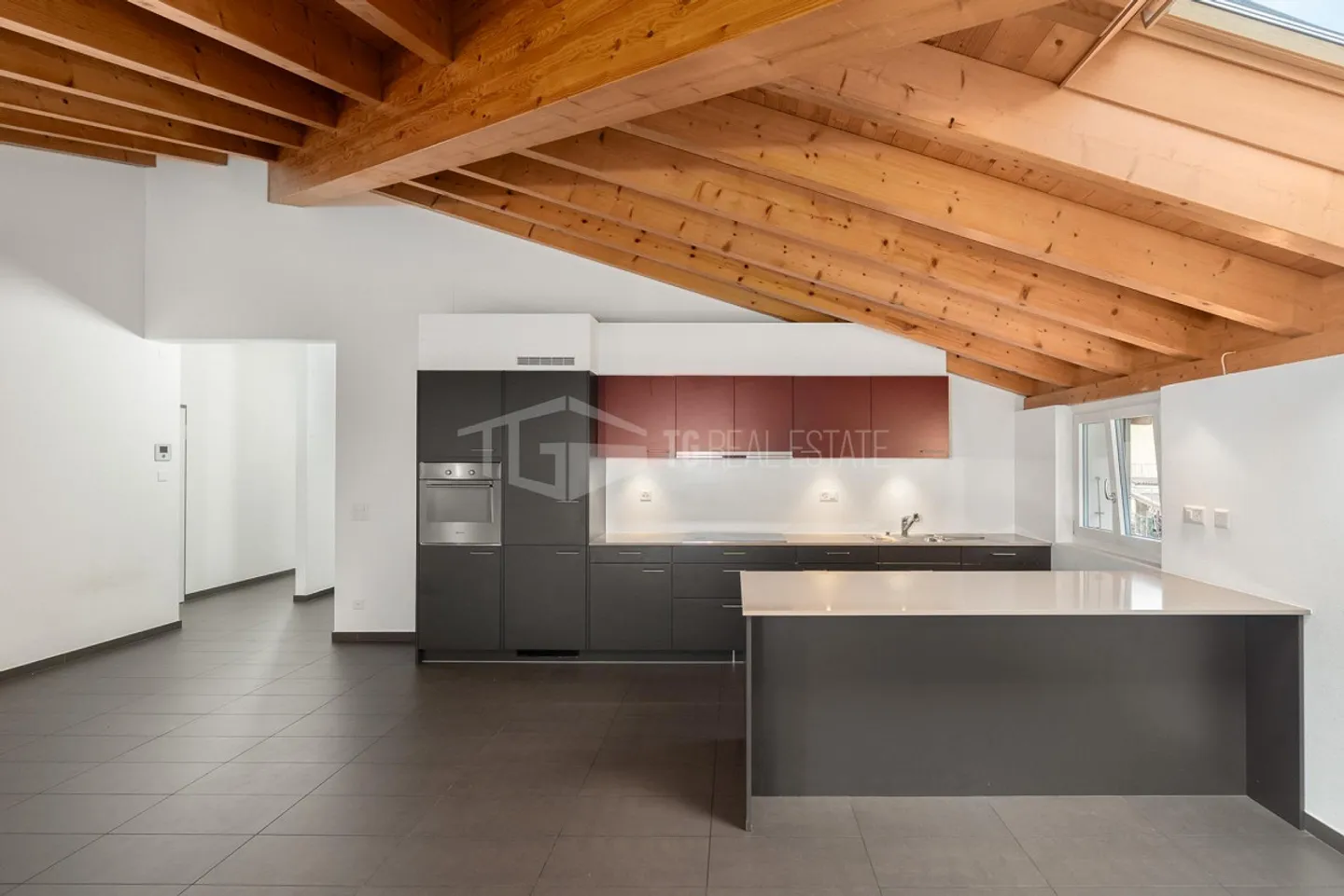 Elegante Dachgeschosswohnung in Cadro - Foto 4 von 10