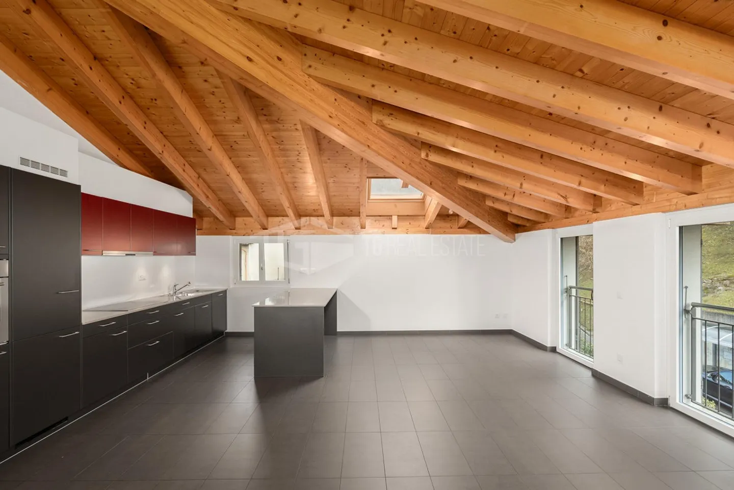 Elegante Dachgeschosswohnung in Cadro - Foto 3 von 10