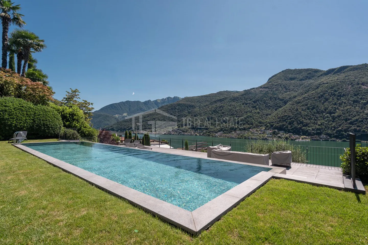 Appartement élégant de 4,5 pièces avec jardin et vue sur le lac - Photo 1 sur 12