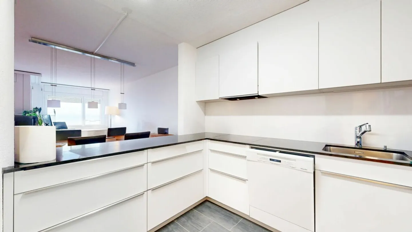 Appartement élégant avec vue sur la ville - Photo 3 sur 10