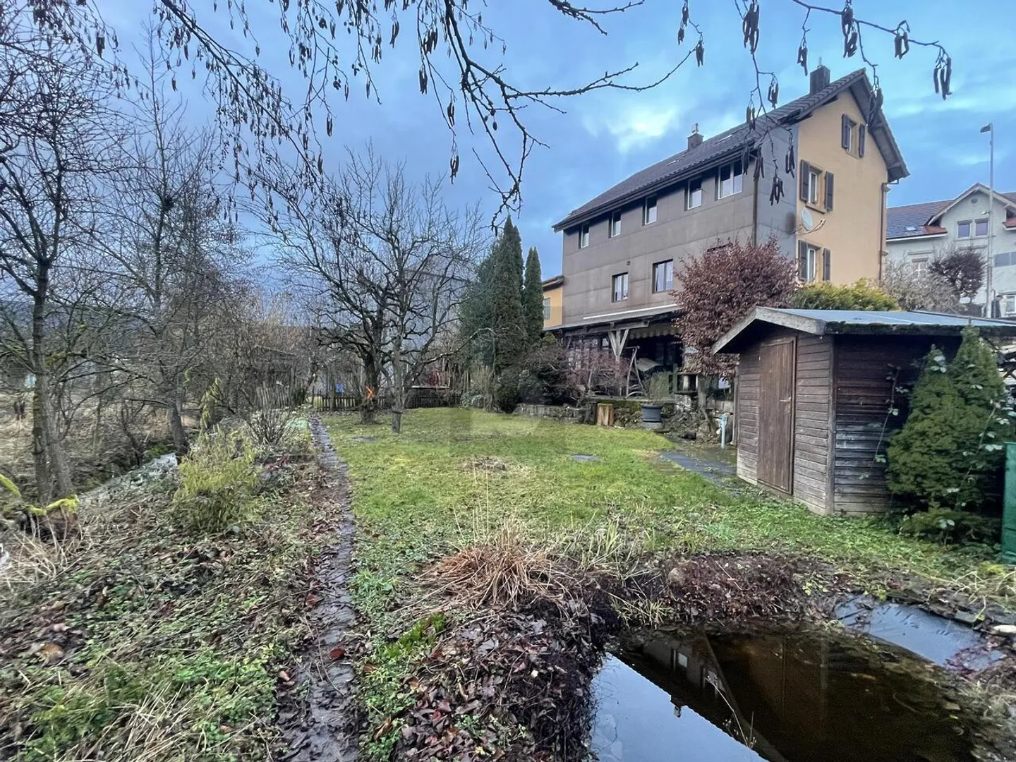 PLENTY OF SPACE WITH GARDEN DIRECTLY BY THE STREAM! - Photo 1 of 5