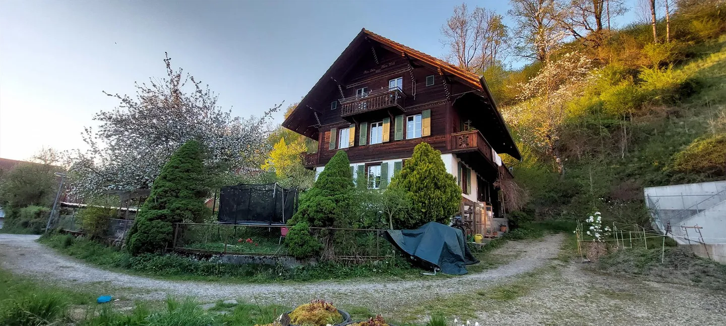 Charmante Wohnung im Holzhaus - Foto 1 von 17