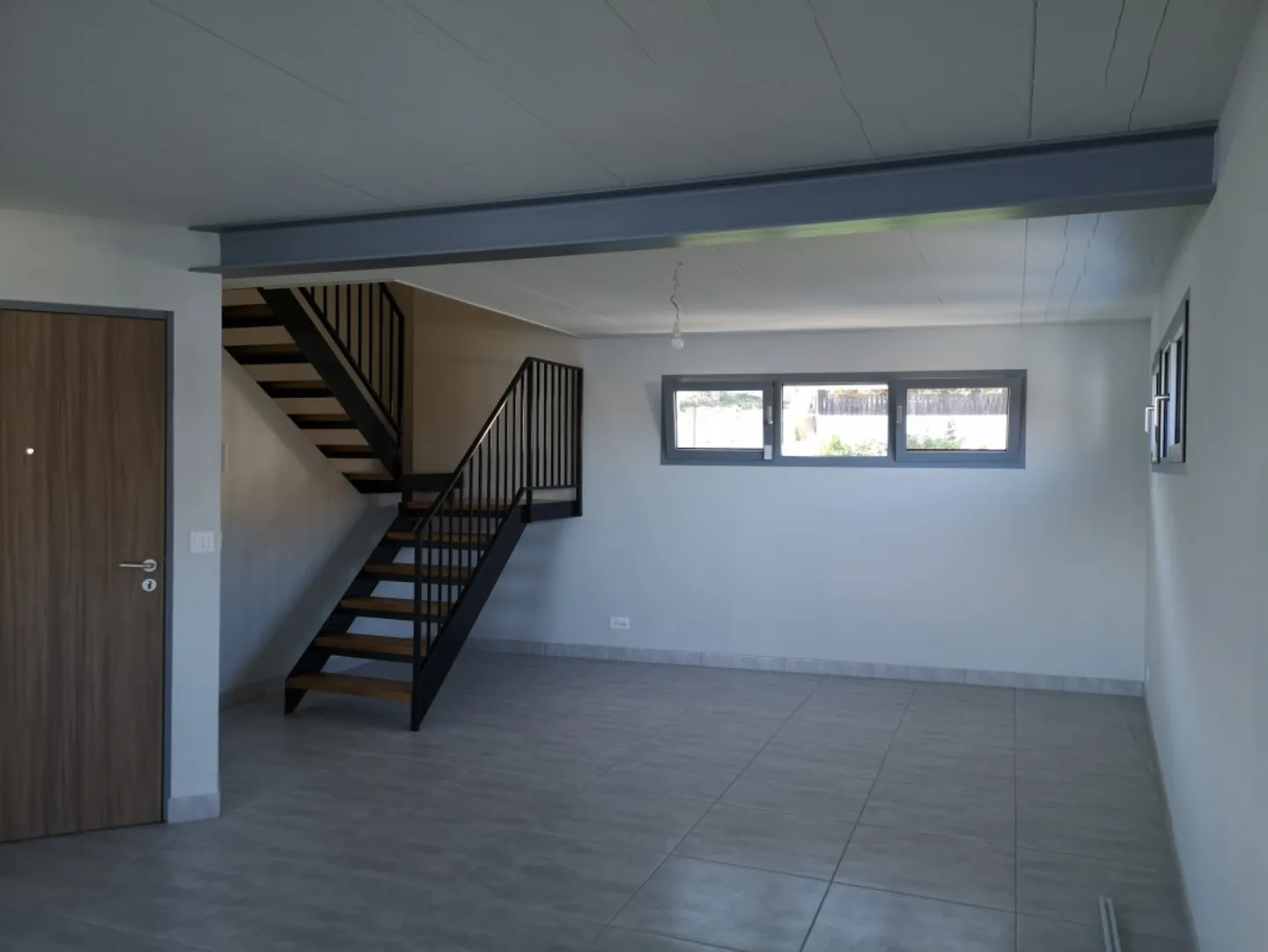 Modern Duplex with Lake View - Photo 4 of 13