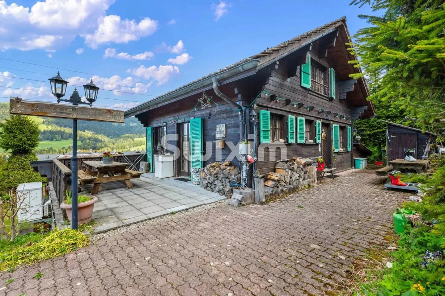 Exklusiv! Wunderschönes Chalet mit zwei Wohnungen am Fuße der Pisten - Foto 1 von 8