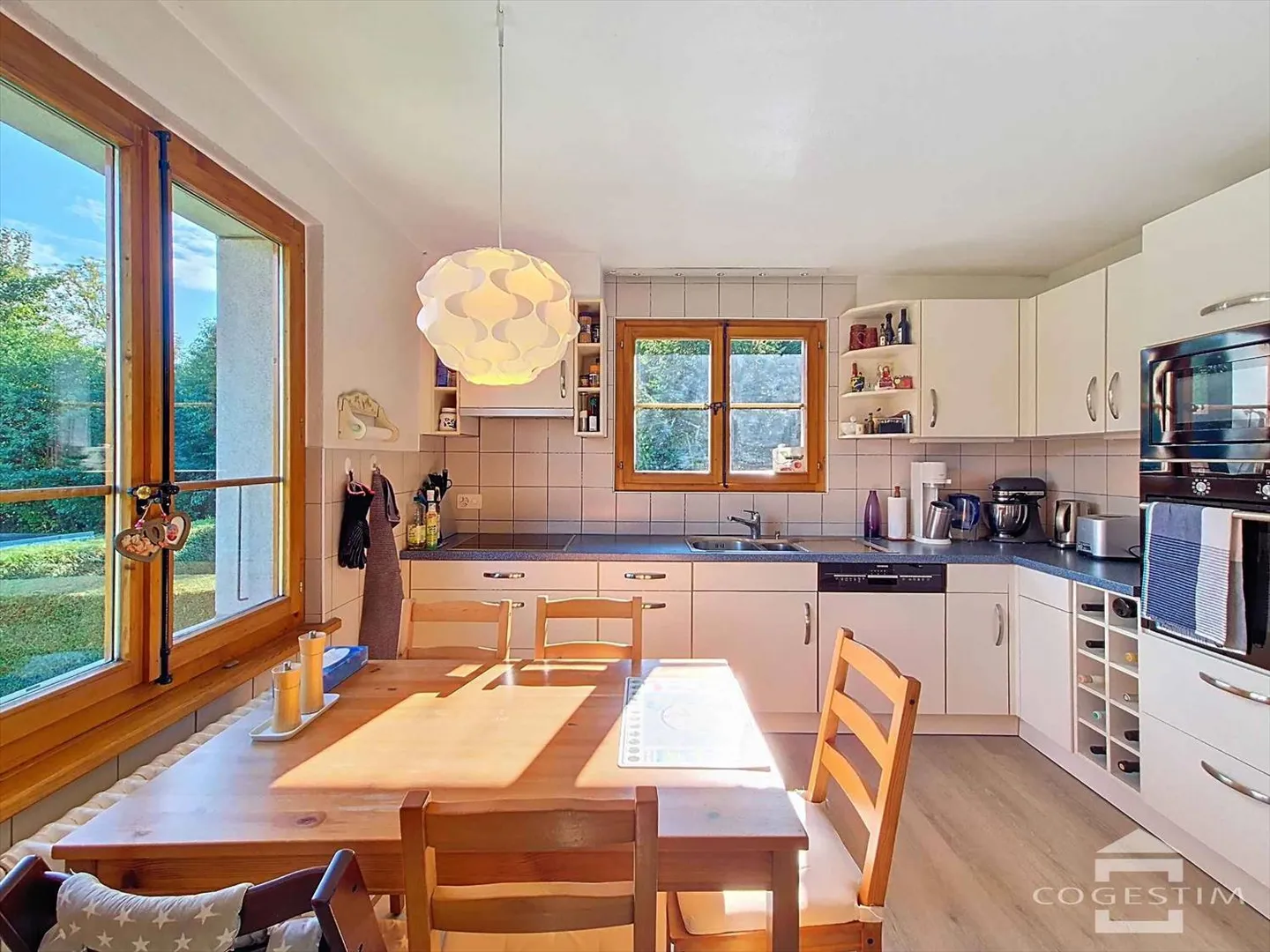 Maison contiguë 5.5 pièces - Photo 5 sur 13