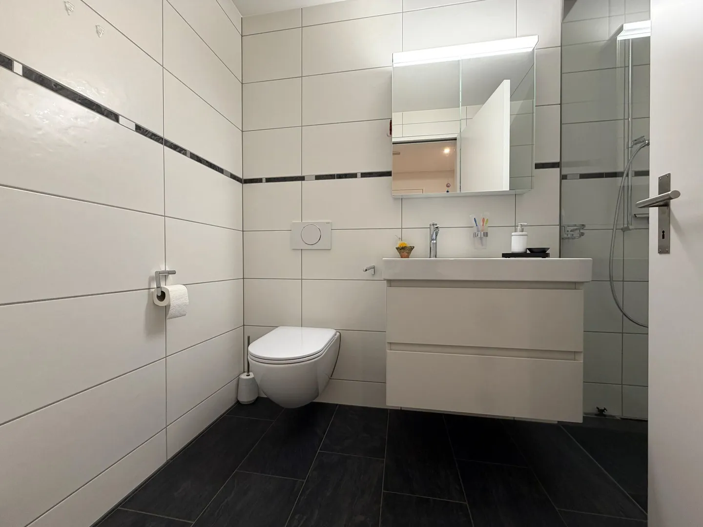 Appartement en terrasse dans un emplacement central mais verdoyant - Photo 14 sur 17