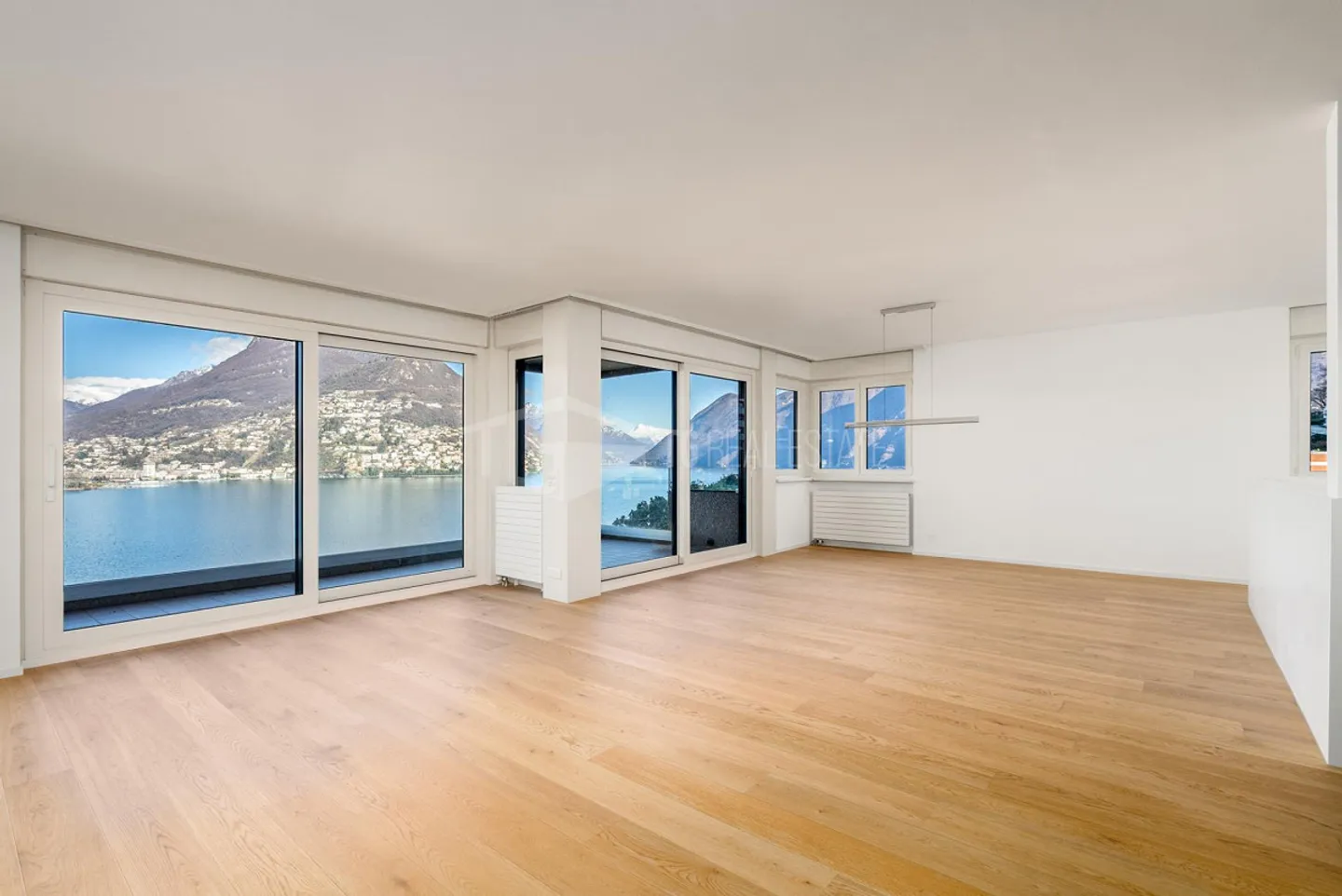 SUPERBE APPARTEMENT DE 4,5 PIÈCES AVEC VUE SUR LE LAC À PARADISO - Photo 7 sur 13