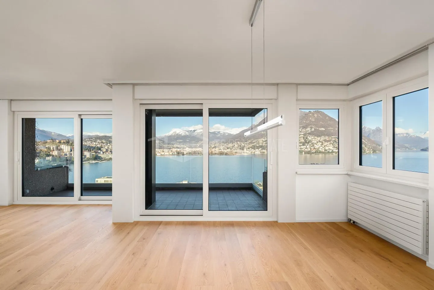 SUPERBE APPARTEMENT DE 4,5 PIÈCES AVEC VUE SUR LE LAC À PARADISO - Photo 8 sur 13