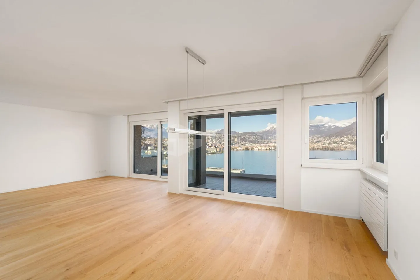 SUPERBE APPARTEMENT DE 4,5 PIÈCES AVEC VUE SUR LE LAC À PARADISO - Photo 9 sur 13