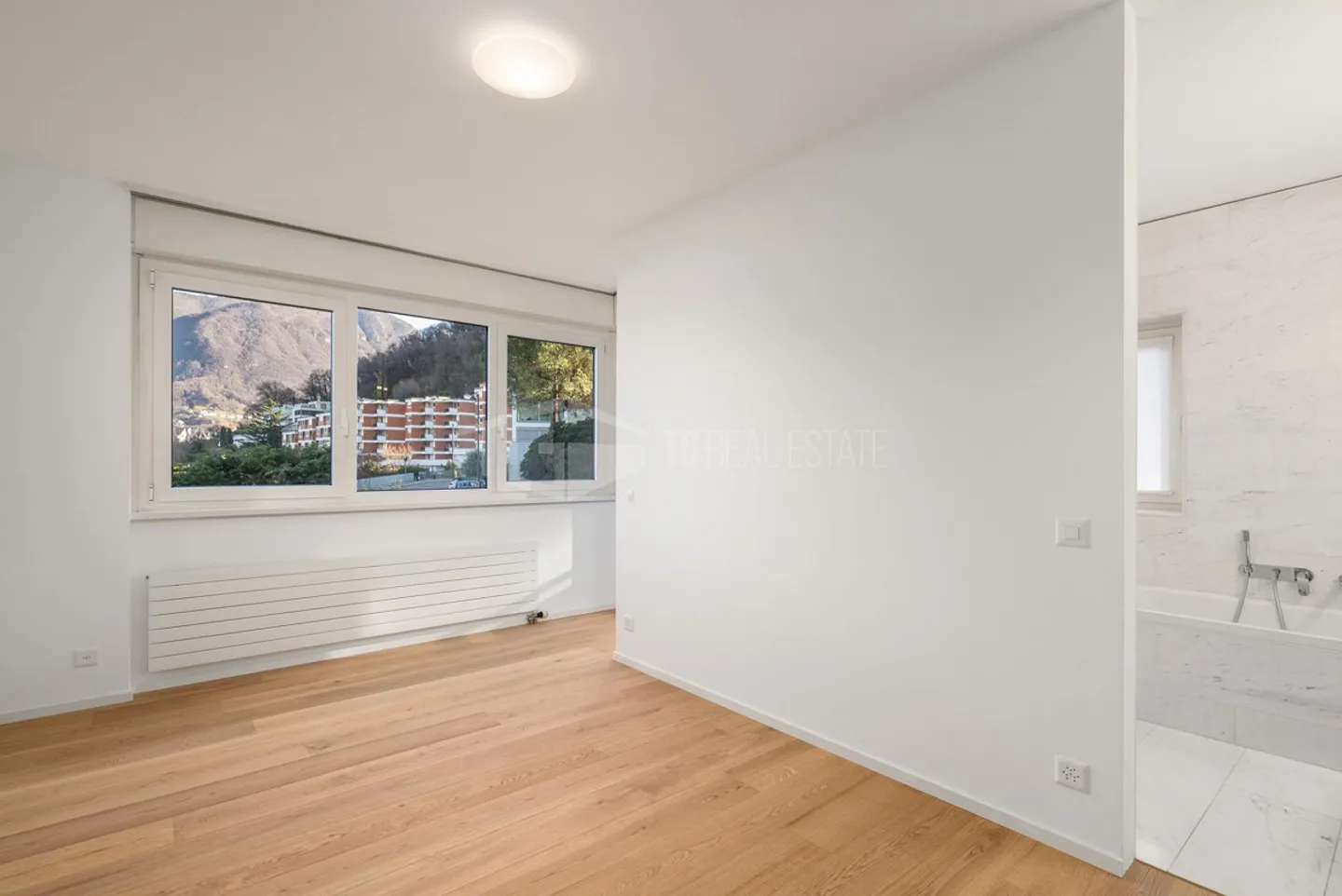 SUPERBE APPARTEMENT DE 4,5 PIÈCES AVEC VUE SUR LE LAC À PARADISO - Photo 3 sur 13