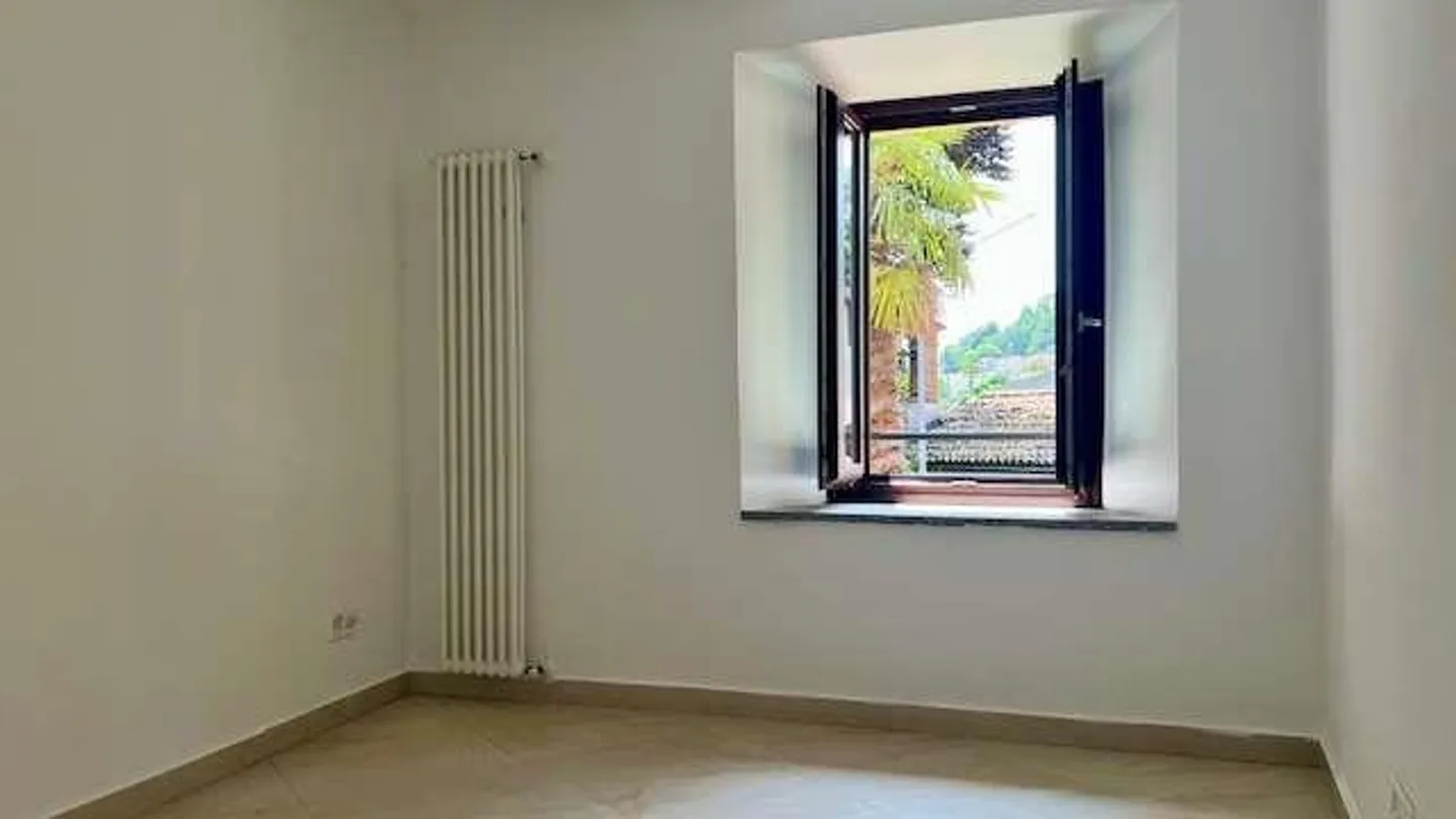 Elegante casa ticinese in un cortile storico - Foto 7 di 13
