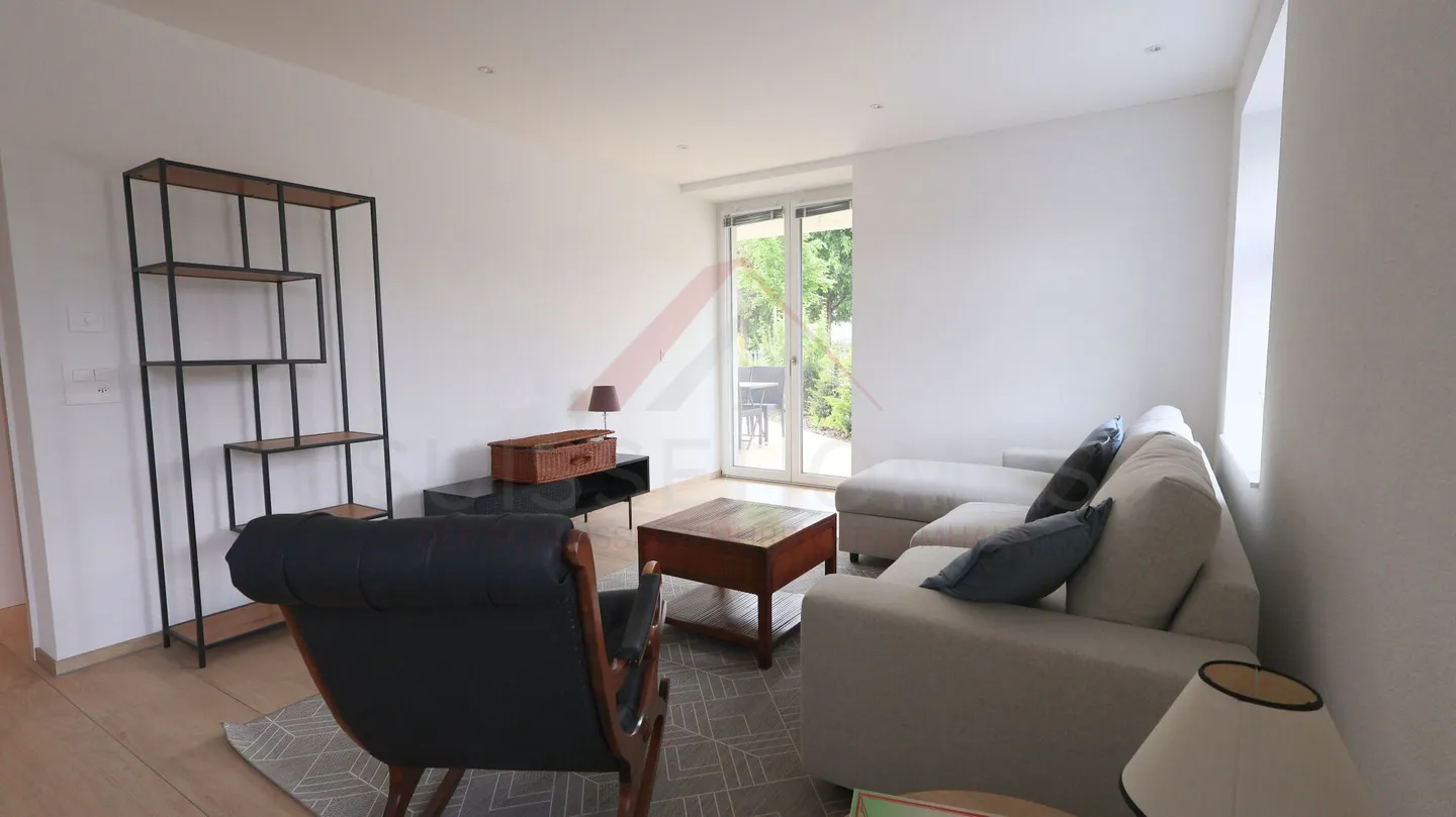 Kleines Juwel mit privatem Garten: 2,5 Zimmer, die Komfort, Ruhe und Intimität vereinen - Foto 1 von 8