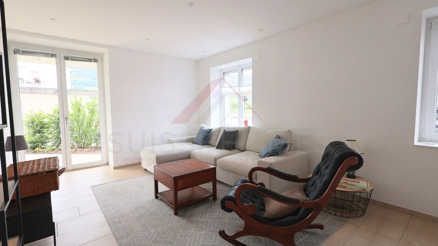 Kleines Juwel mit privatem Garten: 2,5 Zimmer, die Komfort, Ruhe und Intimität vereinen - Foto 2 von 8
