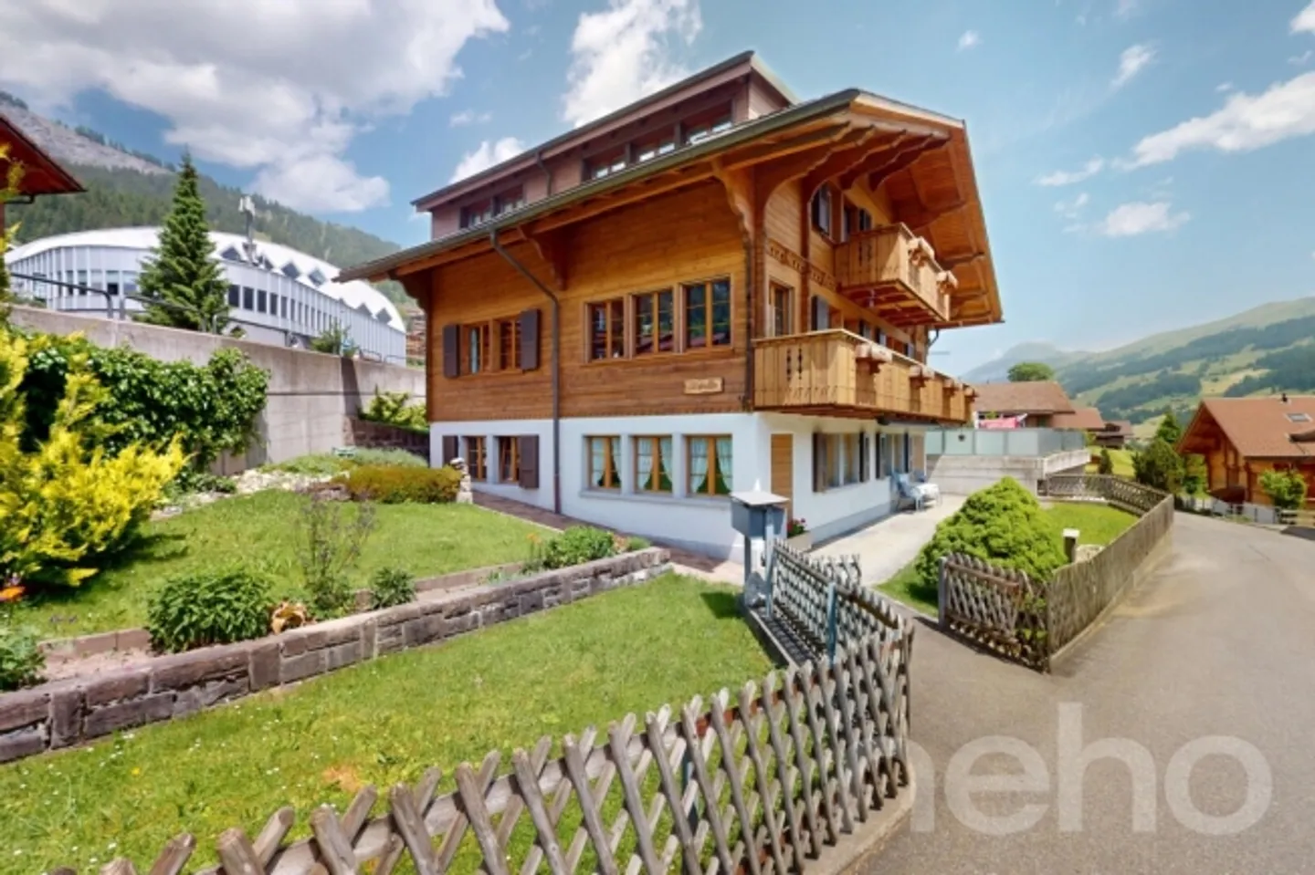 Exclusive Chalet Jewel with Mountain Panorama in Central Location - Photo 1 of 13