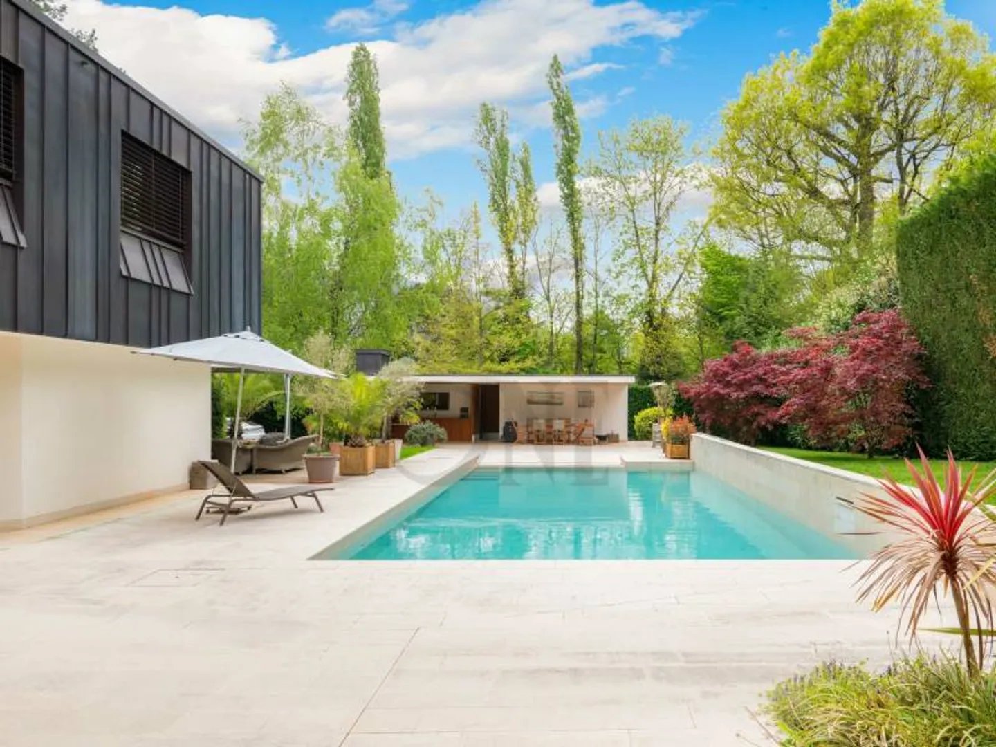 Eine contemporary Villa im Herzen von Conches - Foto 3 von 11
