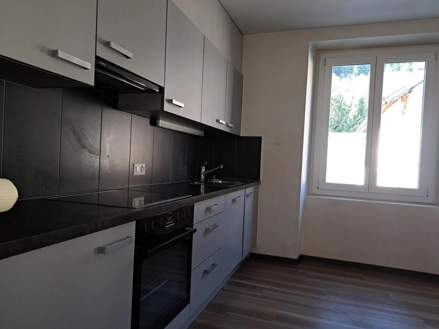 APPARTEMENT DE 3 PIECES AU REZ SUPERIEUR - Photo 1 sur 8