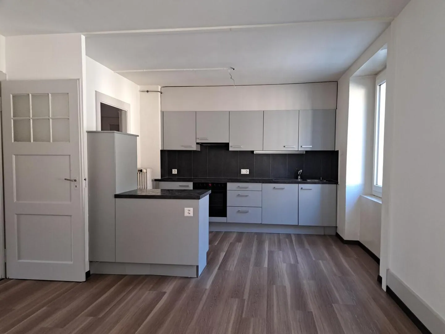 APPARTEMENT DE 3 PIECES AU REZ SUPERIEUR - Photo 2 sur 8