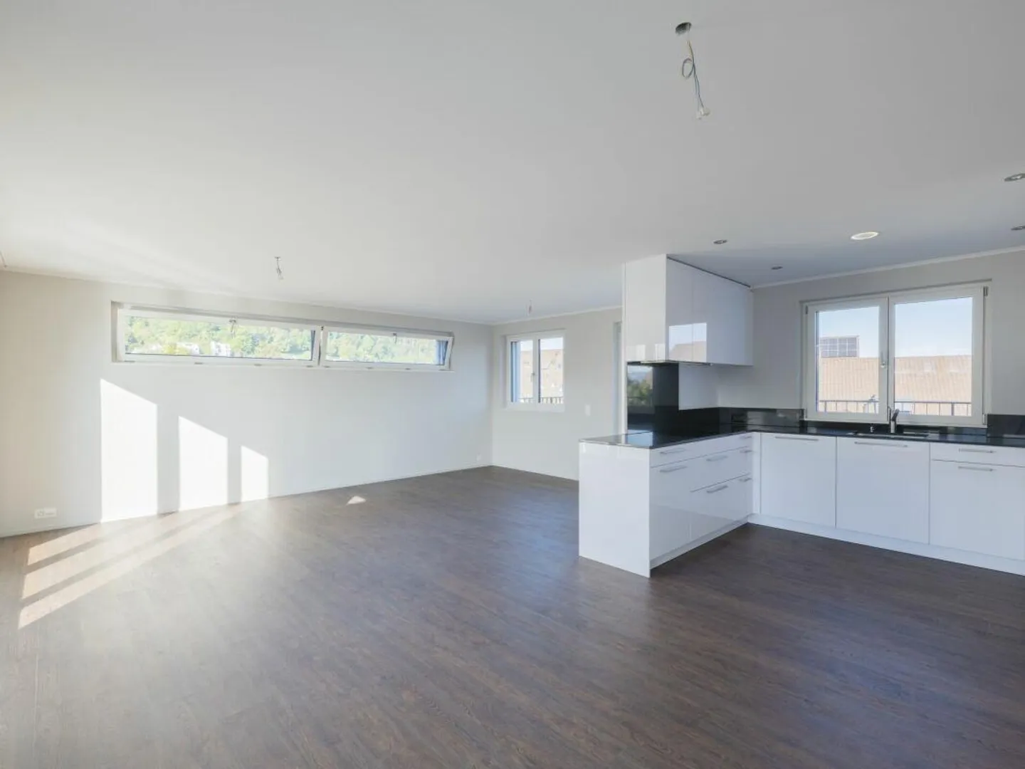 Appartement en attique de 4,5 pièces - Photo 1 sur 12