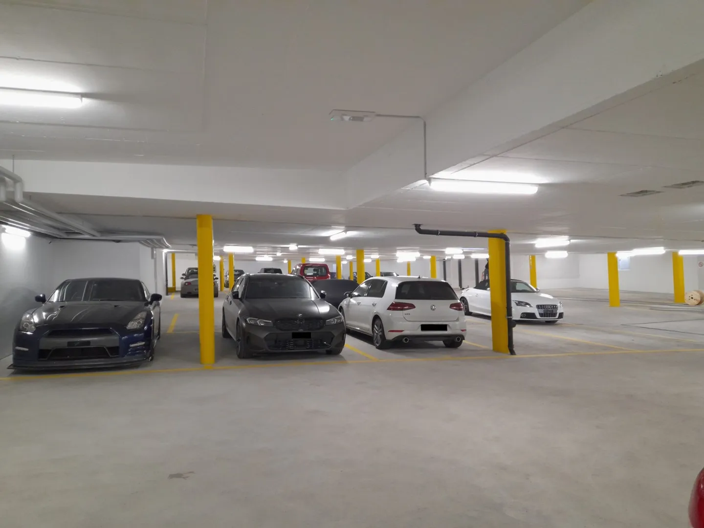 Tiefgaragenplatz! Optional mit Ladestation für E-Fahrzeuge - Foto 2 von 3