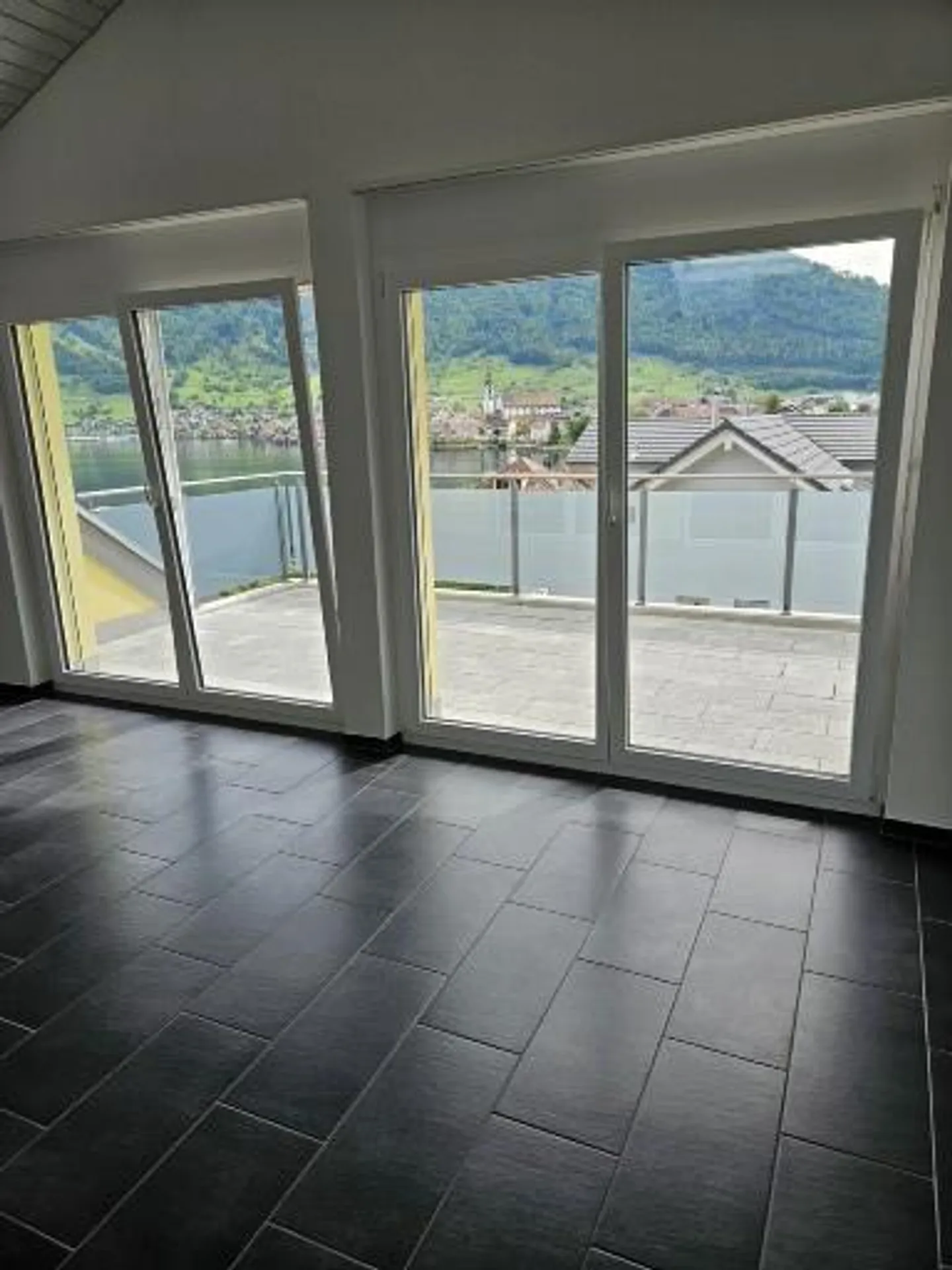 Penthouse mit See- und Bergblick - Foto 15 von 27